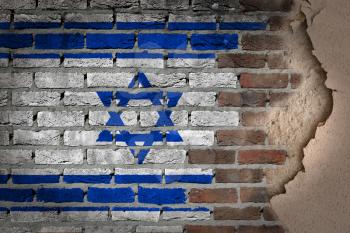 Dark brick wall texture with plaster - flag painted on wall - Israel
