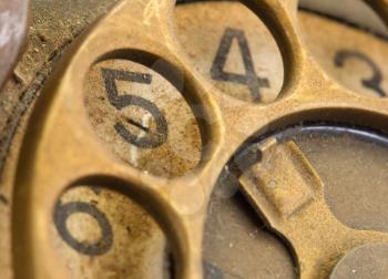 Close up of Vintage phone dial, dirty and scratched - 5, perspective