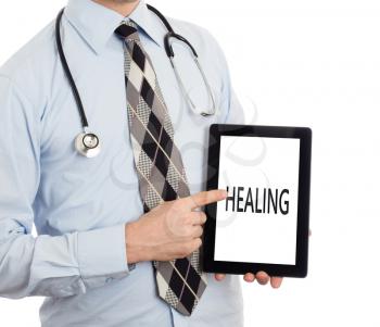 Doctor, isolated on white backgroun,  holding digital tablet - Healing