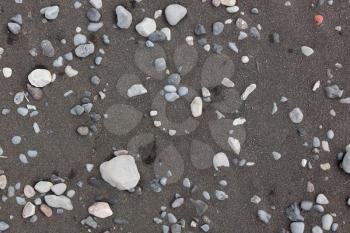 Black sand beach in Iceland, close-up of the sand