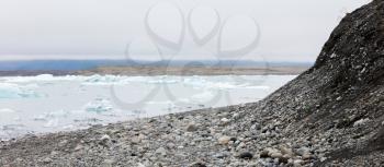 Jokulsarlon is a large glacial lake in southeast Iceland - Ice breaking of a glacier