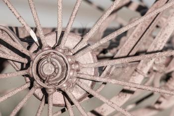 Old rusty wheel of a plow in Iceland - Selective focus