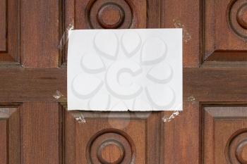 Message for guests on a wooden door