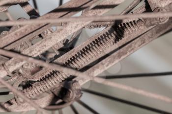 Old rusty wheel of a plow in Iceland - Selective focus