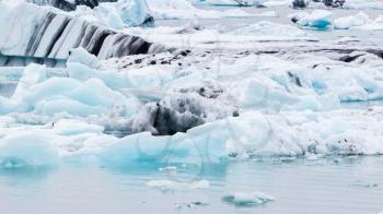 Jokulsarlon is a large glacial lake in southeast Iceland - Ice breaking of a glacier