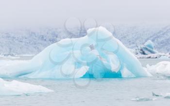 Jokulsarlon is a large glacial lake in southeast Iceland - Ice breaking of a glacier