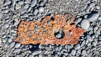 Remains of a boat wreck at the black beach on Iceland Snaefellsnes Dritvik - Selective focus