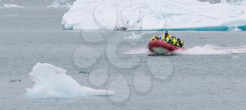 JOKULSARLON, ICELAND - July 21, 2016: Boat adventure on Jokulsarlon glacier lake on July 21, 2016.