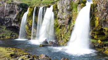 Kirkjufellsfoss waterfall near the Kirkjufell mountain on the north coast of Iceland's Snaefellsnes peninsula