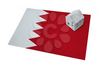 Small house on a flag - Living or migrating to Bahrain