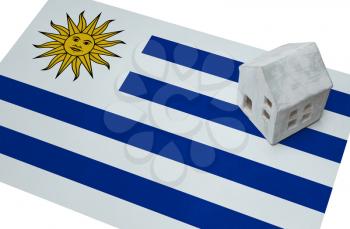 Small house on a flag - Living or migrating to Uruguay