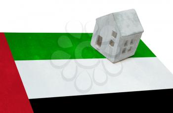 Small house on a flag - Living or migrating to UAE