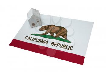 Small house on a flag - Living or migrating to California