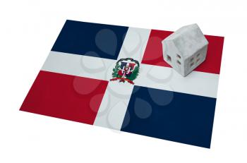 Small house on a flag - Living or migrating to Dominican Republic