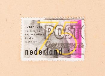 THE NETHERLANDS 1988: A stamp printed in the Netherlands shows 75 years cancer research, circa 1988