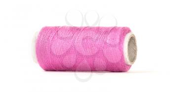 Color sewing thread with needle, isolated on a white background
