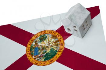 Small house on a flag - Living or migrating to Florida