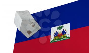 Small house on a flag - Living or migrating to Haiti