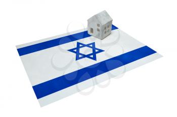 Small house on a flag - Living or migrating to Israel