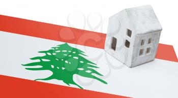 Small house on a flag - Living or migrating to Lebanon