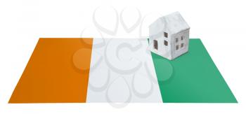 Small house on a flag - Living or migrating to Ivory Coast