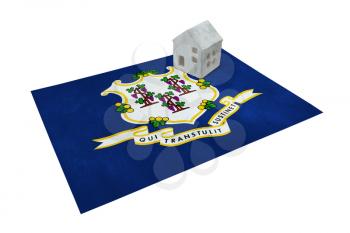 Small house on a flag - Living or migrating to Connecticut