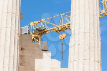 Ancient Parthenon surrounded by scaffolding on the Athenian Acropolis, Greece