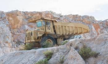 Old industrial truck for stone waiting on a site in Greece