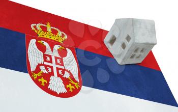 Small house on a flag - Living or migrating to Serbia
