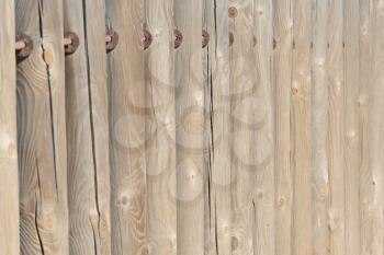 Wood plank brown texture background, part of a fence