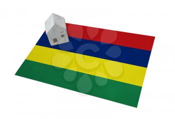 Small house on a flag - Living or migrating to Mauritius