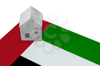 Small house on a flag - Living or migrating to UAE