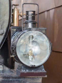 Large old light on a train in the Netherlands