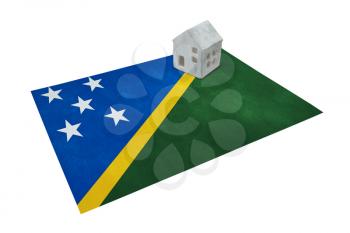 Small house on a flag - Living or migrating to Solomon Islands
