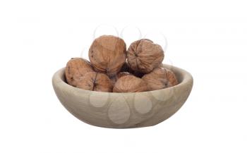 Wallnuts in a bowl, isolated on white