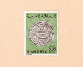 MOROCCO - CIRCA 1980: A stamp printed in Morocco shows an old coin, circa 1980