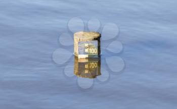 Close view on a measuring pole - Lake in the Netherlands
