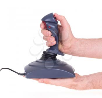 Hand holding gaming joystick, isolated on a white background