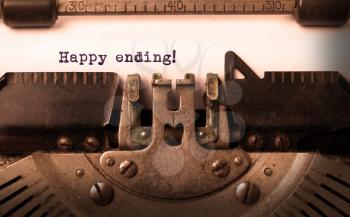 Vintage inscription made by old typewriter, happy ending