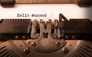 Vintage inscription made by old typewriter, hallo summer