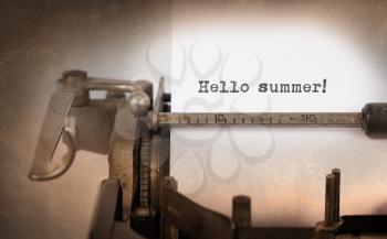 Vintage inscription made by old typewriter, Hello summer