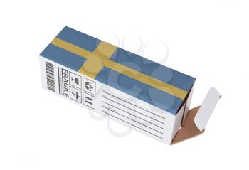 Concept of export, opened paper box - Product of Sweden