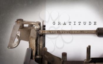 Close-up of a vintage typewriter, old and rusty, gratitude