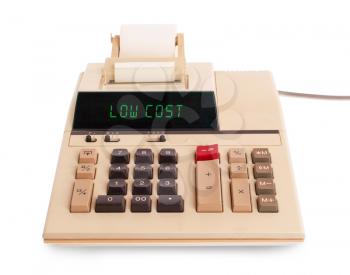 Old calculator showing a text on display - low cost