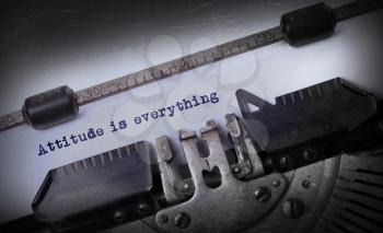 Vintage inscription made by old typewriter, Attitude is everything