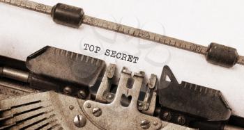 Vintage typewriter, old rusty and used, Top secret