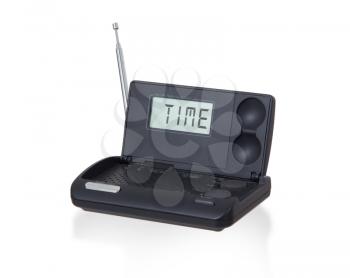 Old digital radio alarm clock isolated on white - Time