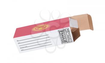 Concept of export, opened paper box - Product of Kyrgyzstan