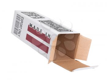Concept of export, opened paper box - Product of Latvia