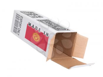 Concept of export, opened paper box - Product of Kyrgyzstan